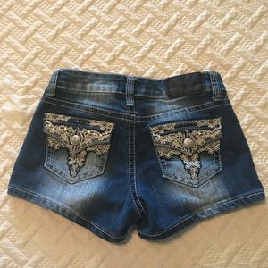 Denim shorts size 3.  Great embellishments!